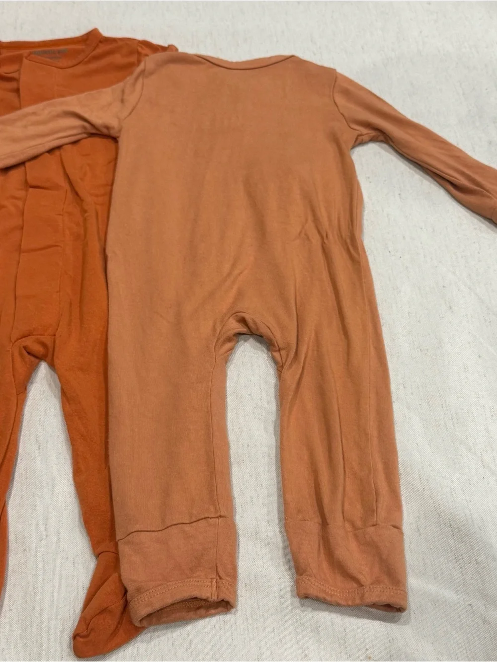 Kyte Baby + Magnetic Me Bundle Set Rust Orange Footed Sleeper Modal Bamboo 3-6m